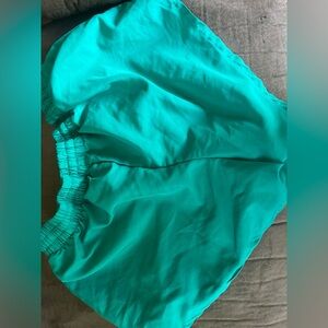 A turquoise pair of shorts from Danskin now an extra small